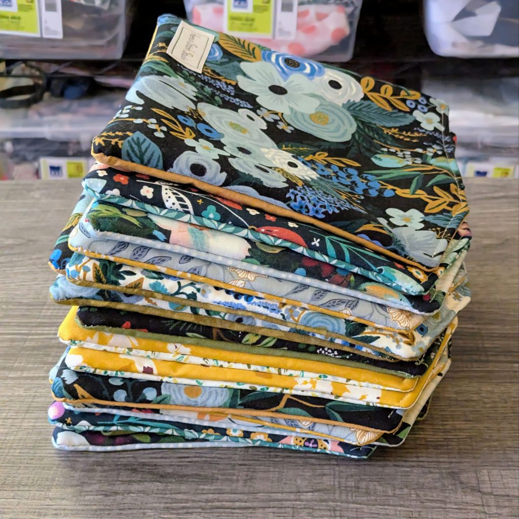 Stack of in pregress eyeglass pouches.